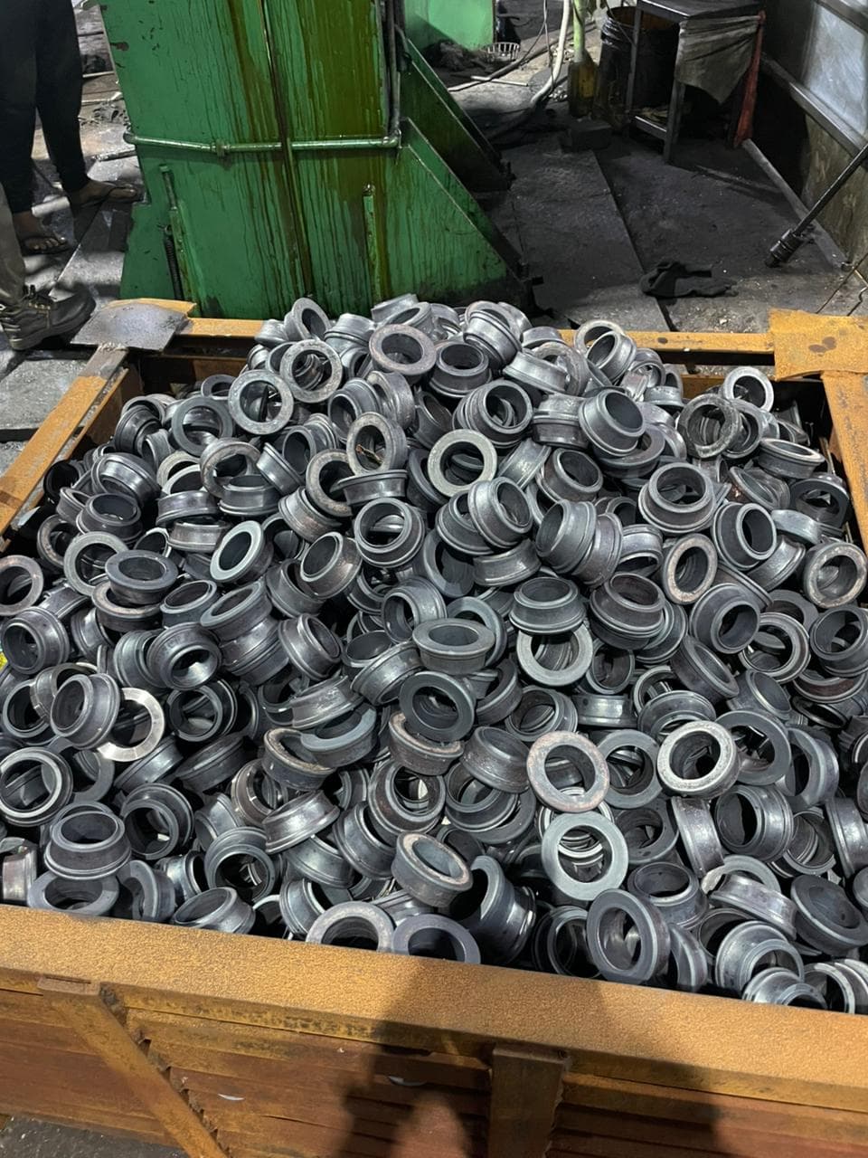 Machined bearing races laid out for final inspection and packaging.